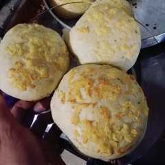 Una foto de Pan quesú