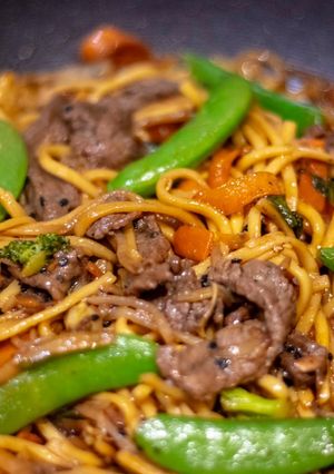 A picture of Easy stir fried honey and soysauce beef with egg noodles.