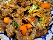 A picture of thin sliced beef stir fried
