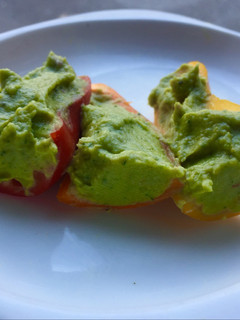 A picture of Hummus with Avocado.