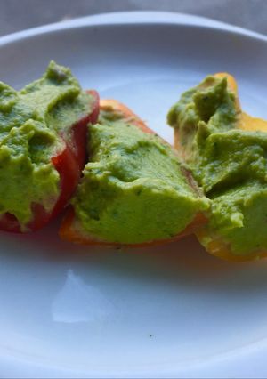 A picture of Hummus with Avocado.