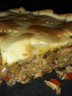 Una foto de Empanada gallega a mi manera