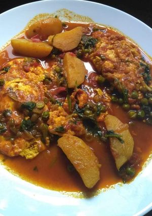 A picture of Egg porch with veg curry.
