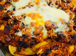 Una foto de Papas fritas chili con carne🇲🇽🇺🇸🇺🇾🇯🇵チリビーンズポテト