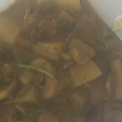 A picture of Mushroom, Aubergine and Potato Curry.