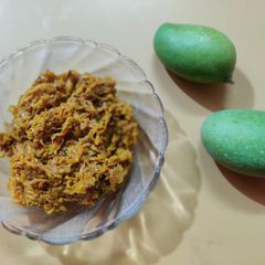 A picture of Grated mango pickle.