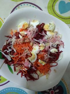 Una foto de Ensalada de col colorida