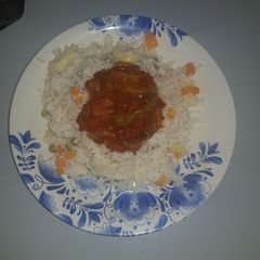 A picture of White rice with veggies.