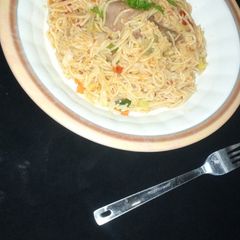 A picture of Jollof spaghetti.