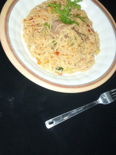 A picture of Jollof spaghetti.