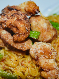 A picture of Asian Fusion Pasta with Chicken Popcorn.