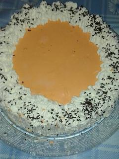 Una foto de Tarta de zumo de mandarina natural y queso
