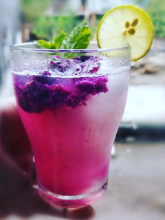 A picture of Lemon slush with Jamun compote.