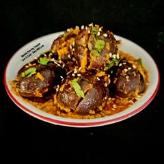 Authentic Maharastrian Bharli Vangi - Stuffed Brinjal - Eggplant A picture of Authentic Maharastrian Bharli Vangi - Stuffed Brinjal - Eggplant.