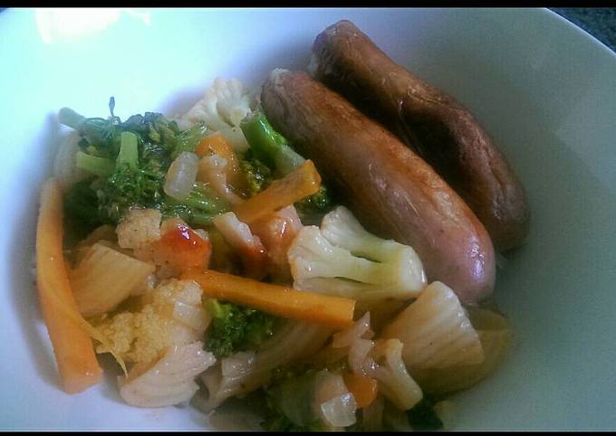 Cauliflower,broccoli and pasta served with sausages