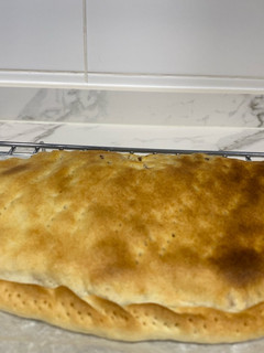 Una foto de Empanada de carne, pollo y bacon