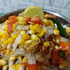 A picture of Corn chaat.