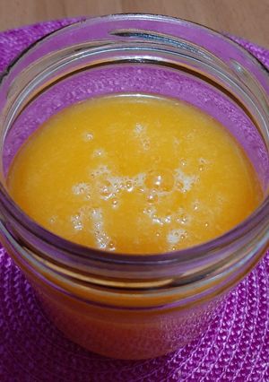 Una foto de Jugo de mango y mandarina