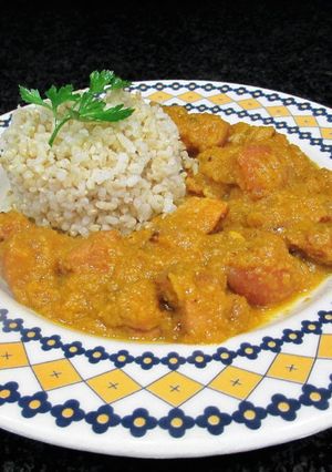 Una foto de Panceta en salsa de calabaza al brandy con guarnición de arroz integral