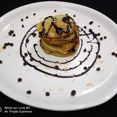 A picture of Eggless banana pancakes.