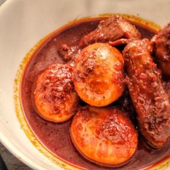 A picture of Egg and Chicken in Spicy and Sweet Sauce.