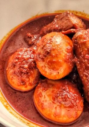 A picture of Egg and Chicken in Spicy and Sweet Sauce.