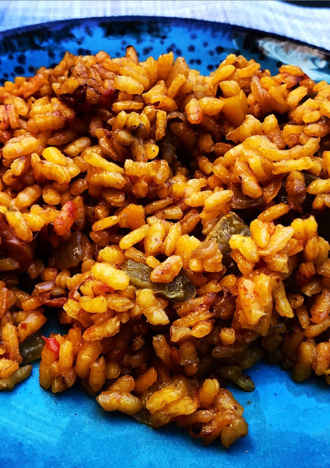 Una foto de Arroz seco de pulpo y alcachofas