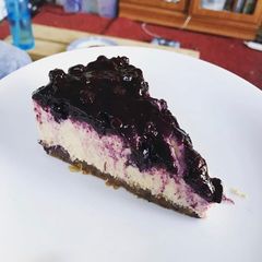 Vegan Lemon & Blueberry Cheesecake (contains nuts) A picture of Vegan Lemon & Blueberry Cheesecake (contains nuts).