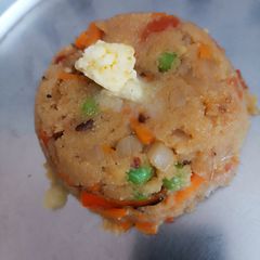 A picture of Peas/tomato Upma.