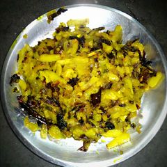 A picture of Ucche aaloo bhaja (bitter gourd Potatoes fry).
