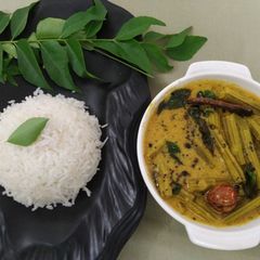 A picture of Drumstick Curry/Murungakkai Mor Kuzhambu.