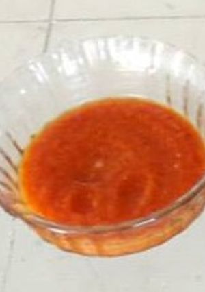 Una foto de Salsa de chile serrano, naranja con canela y tequila