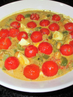 Una foto de Tomatitos cherry en salsa de mostaza con cacahuetes