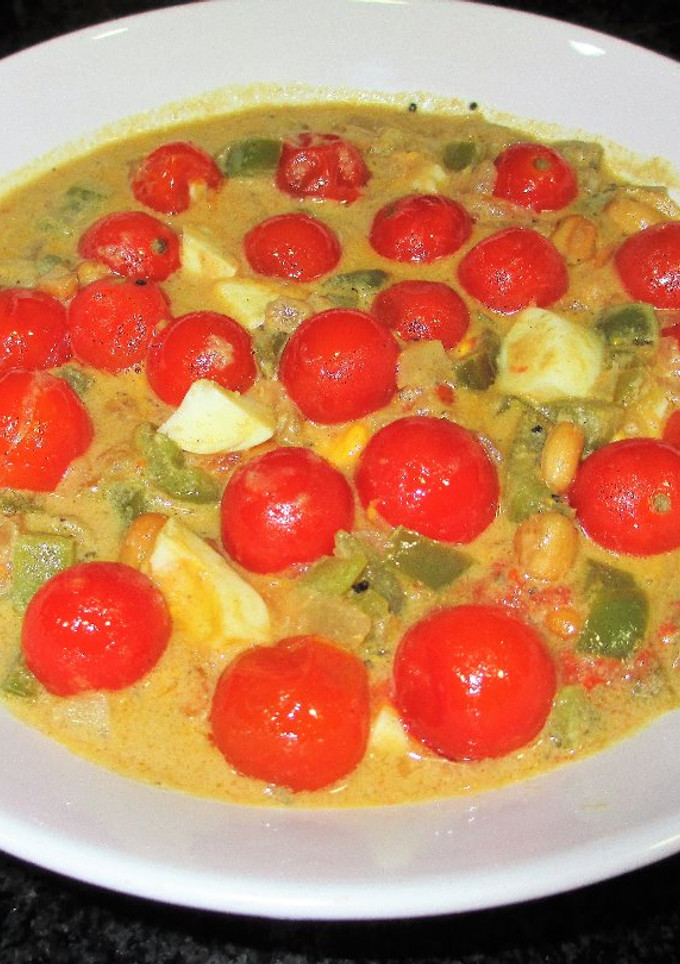 Una foto de Tomatitos cherry en salsa de mostaza con cacahuetes