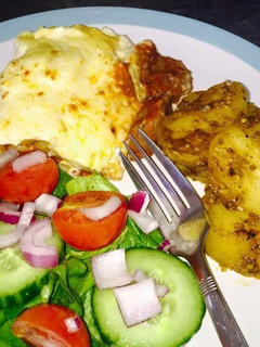A picture of Beef Lasagne served with slow cooked potatoes #potatoescontest.