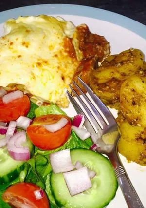 A picture of Beef Lasagne served with slow cooked potatoes #potatoescontest.