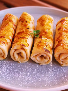 Una foto de Crepes caramelizadas rellenas de crema de vainilla