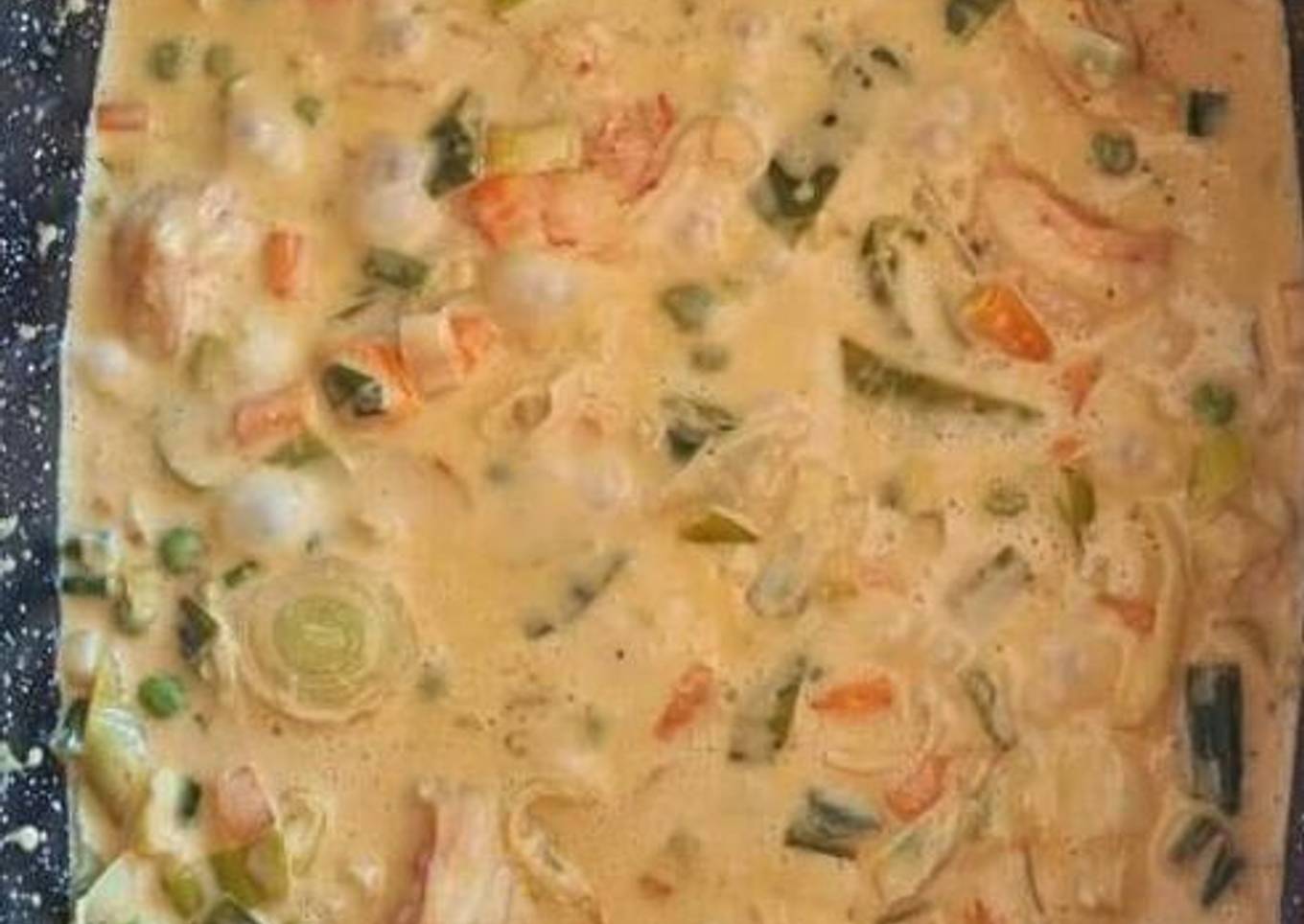 Creamy vegetable soup with shrimps in 3 colors
