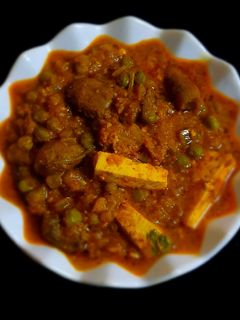 A picture of Mushroom Matar Paneer Masala.
