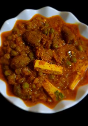 A picture of Mushroom Matar Paneer Masala.