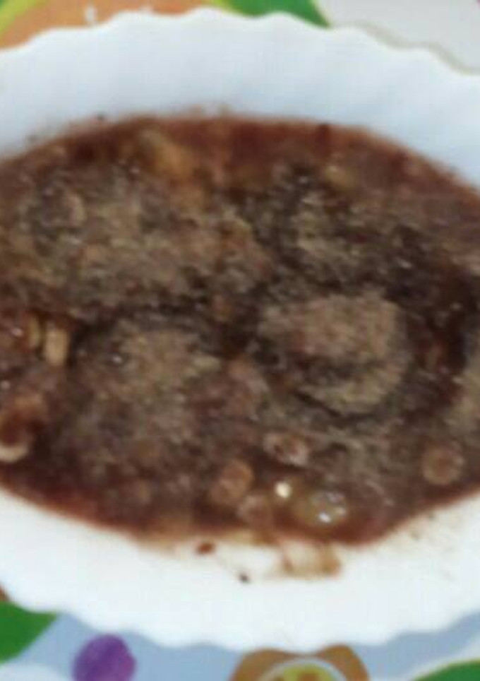 Una foto de Puré de plátano, zumo de cerezas con cereales y sirope de arce