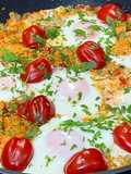 Fried Eggs with Bulgur and Tomatoes