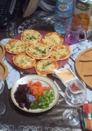 صورة لوصفة بيتزا 😍