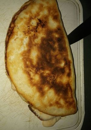 Una foto de Calzoni a la sartén y pizzas no vegan