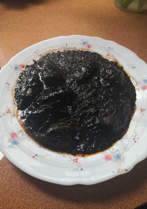 Una foto de Txipirones en su tinta