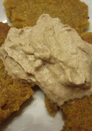 A picture of Spiced JohnnyCakes with Cardamom Whipped Cream.