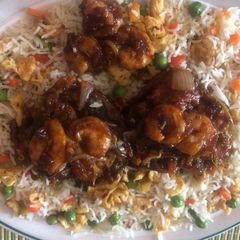 A picture of Fried rice 🍚 with Kung pao prawns 🍤.