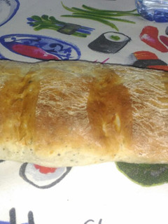 Una foto de Pan de queso y hierbas aromáticas