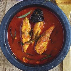 A picture of Ambot thik (red fish curry).
