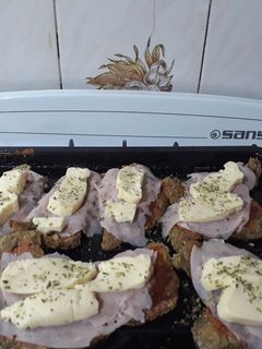 Una foto de Milanesas a la napolitana. Grace